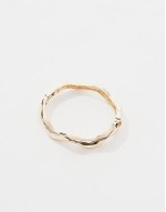 Curve bangle bracelet with wave detail in gold tone
