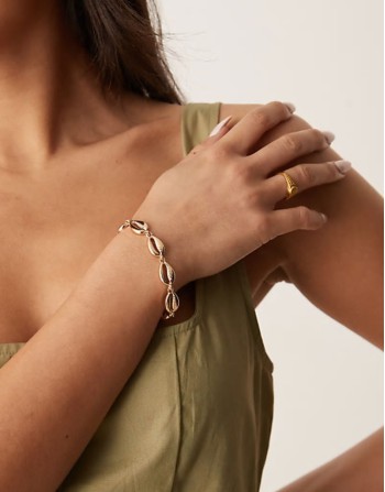 chain bracelet with faux shell detail in gold tone