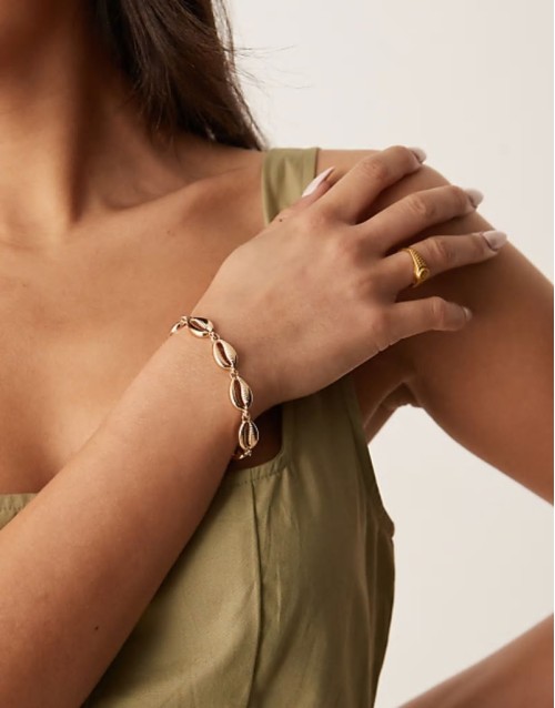 chain bracelet with faux shell detail in gold tone