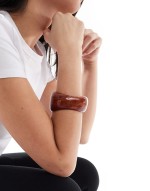 bangle bracelet with abstract detail in amber