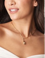 necklace with teardrop pendant in gold tone