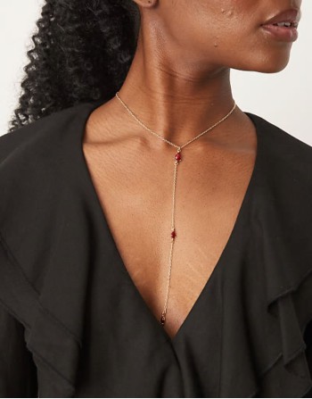 lariat necklace with red crystals in gold