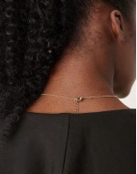 lariat necklace with red crystals in gold