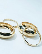 pack of 4 bangle bracelets in mixed design in gold tone