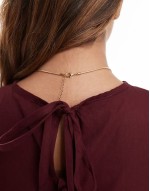 necklace with molten pendant in gold tone