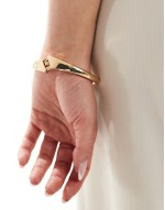 twisted knot bangle in gold
