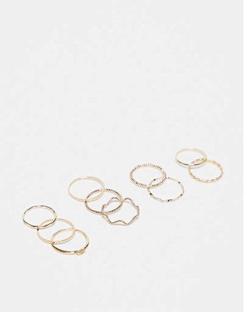 pack of 12 rings with twist details and engraved designs in gold tone
