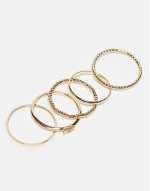 pack of 12 rings with twist details and engraved designs in gold tone