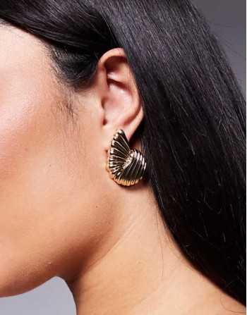 statement shell earrings in gold