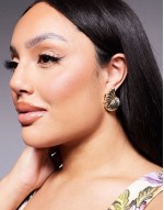 statement shell earrings in gold