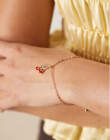 cherry charm bracelet in gold