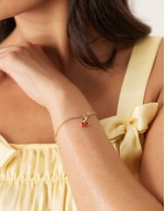 cherry charm bracelet in gold